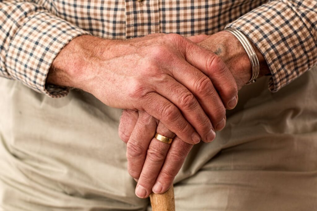hands-walking-stick-elderly-old-person Ospitalità per persone anziane a Parma